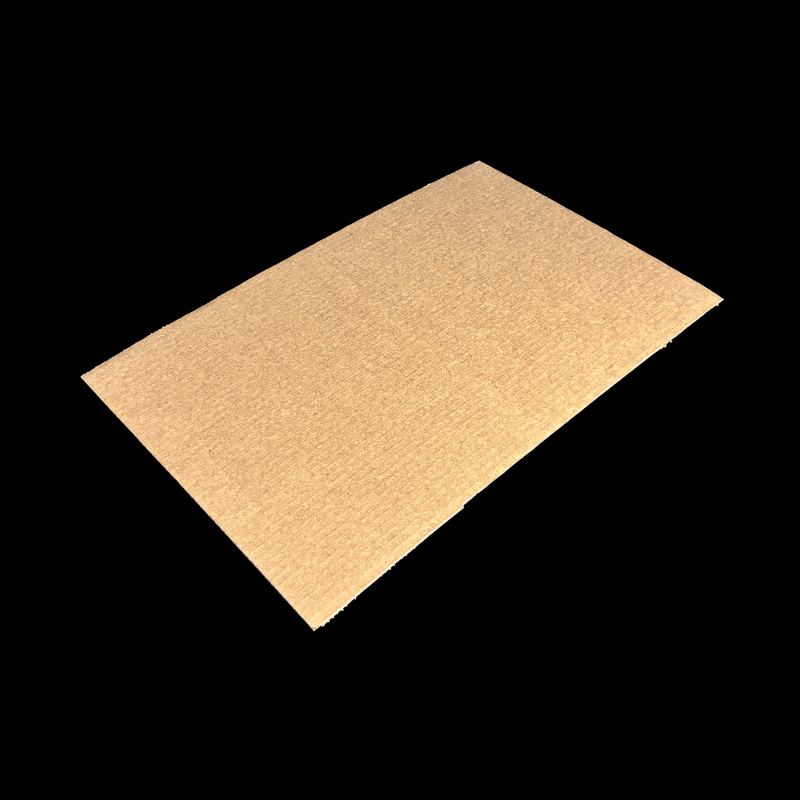 A flat, Kraft cover for corrugated boxes.