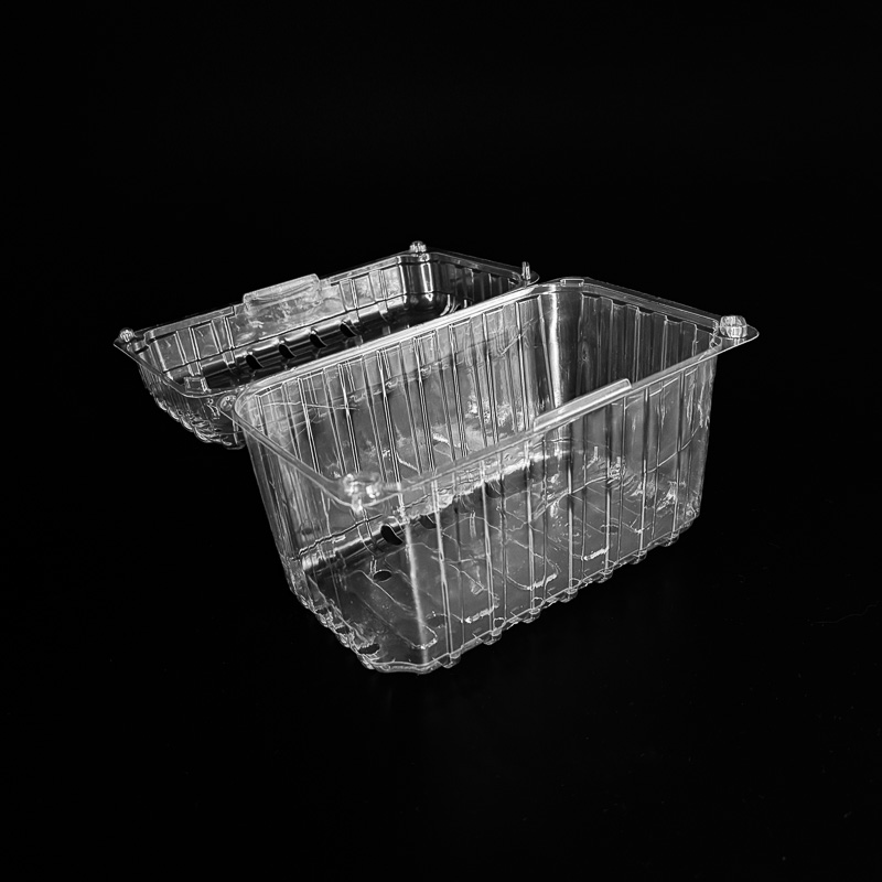 An open 2 pound clear clamshell for grapes.