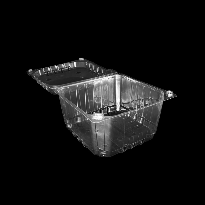 An open 3 pound clear clamshell for grapes.