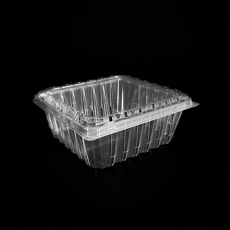 A clear, 2 pound clamshell for blueberries and grapes.