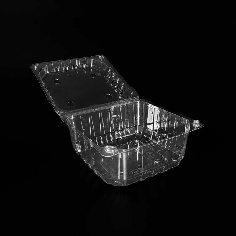 An open clear 3 pound clamshell for fresh produce.