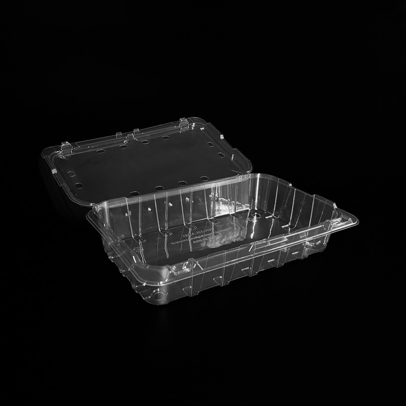 An open clear, hinged 2 pound clamshell for cherries.