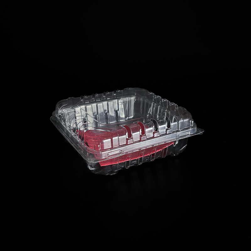 A 6 ounce clear clamshell for raspberries.