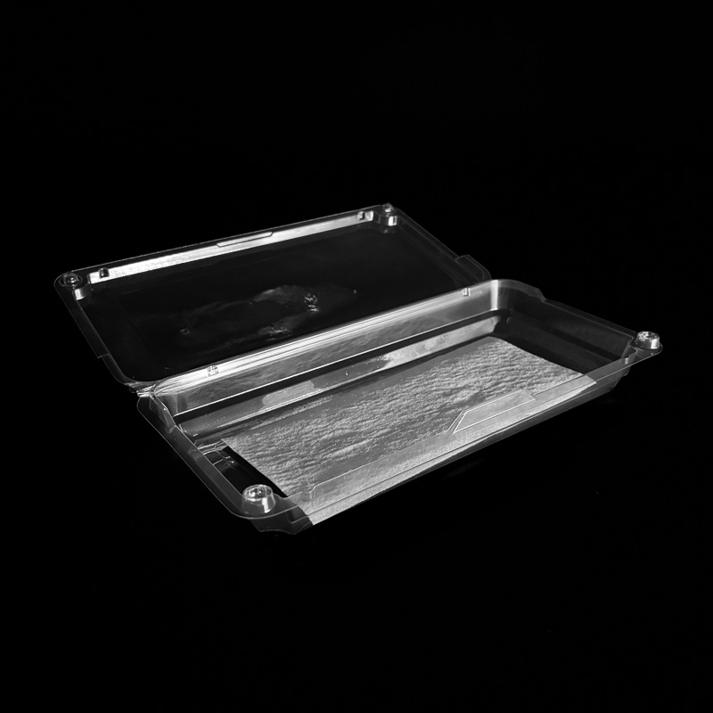 An open 12 ounce clear clamshell for raspberries.