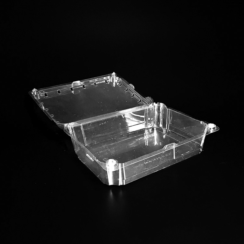 A clear clamshell for holding 1 pound of fresh kiwi.