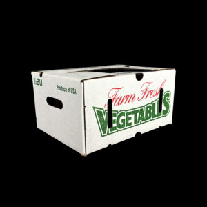 A corrugated box for holding 1/2 bushel of vegetables.