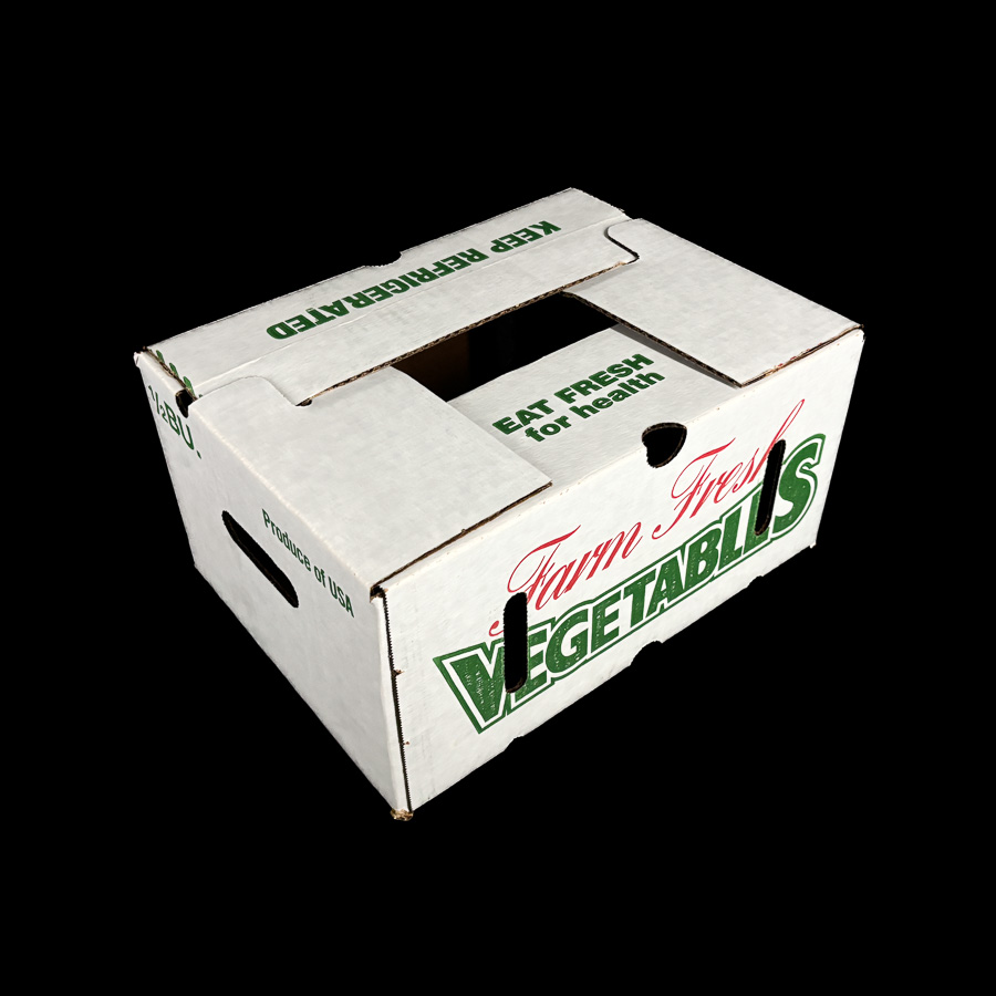 A corrugated box for holding 1/2 bushel of vegetables.